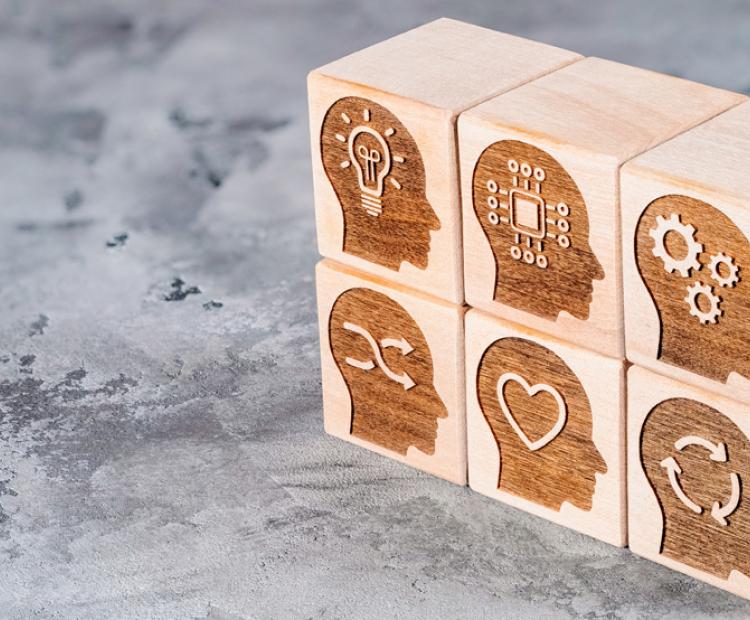 Wooden blocks with different skills icon carved into